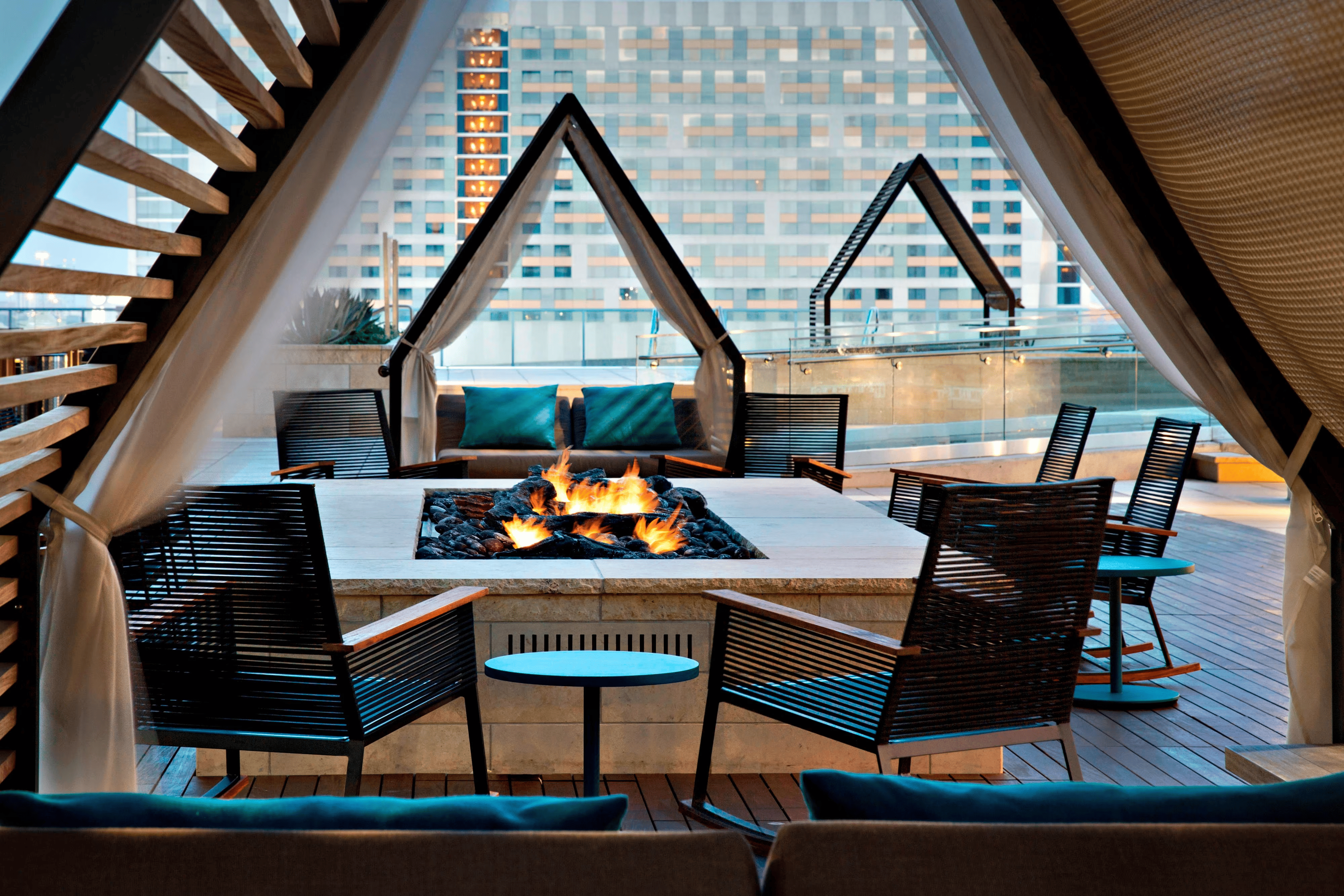A fire pit on the roof top bar of the Marriot Marquis Houston